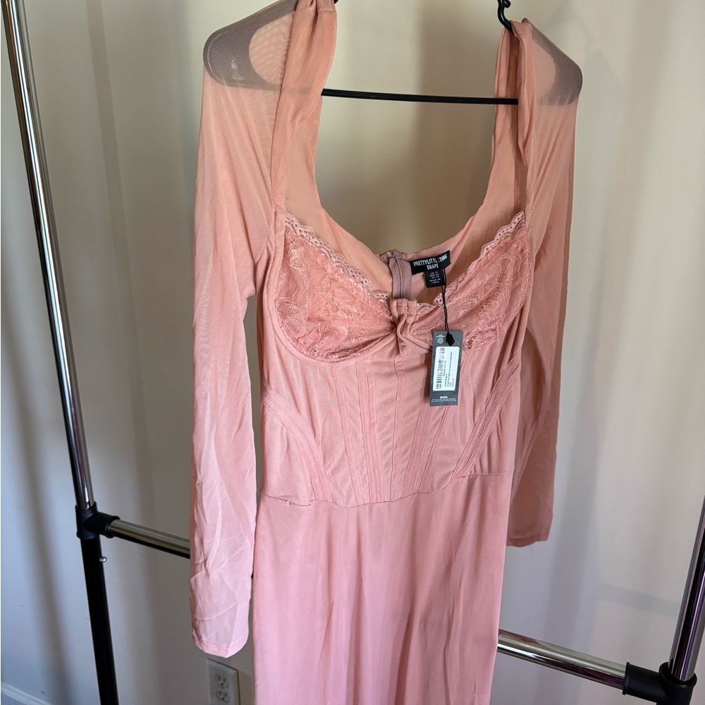 PrettyLittleThing’s Secret Blush Lace Dress